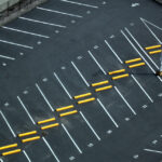 Abstract,Aerial,Shots,Of,Parking,Lot,With,White,And,Yellow