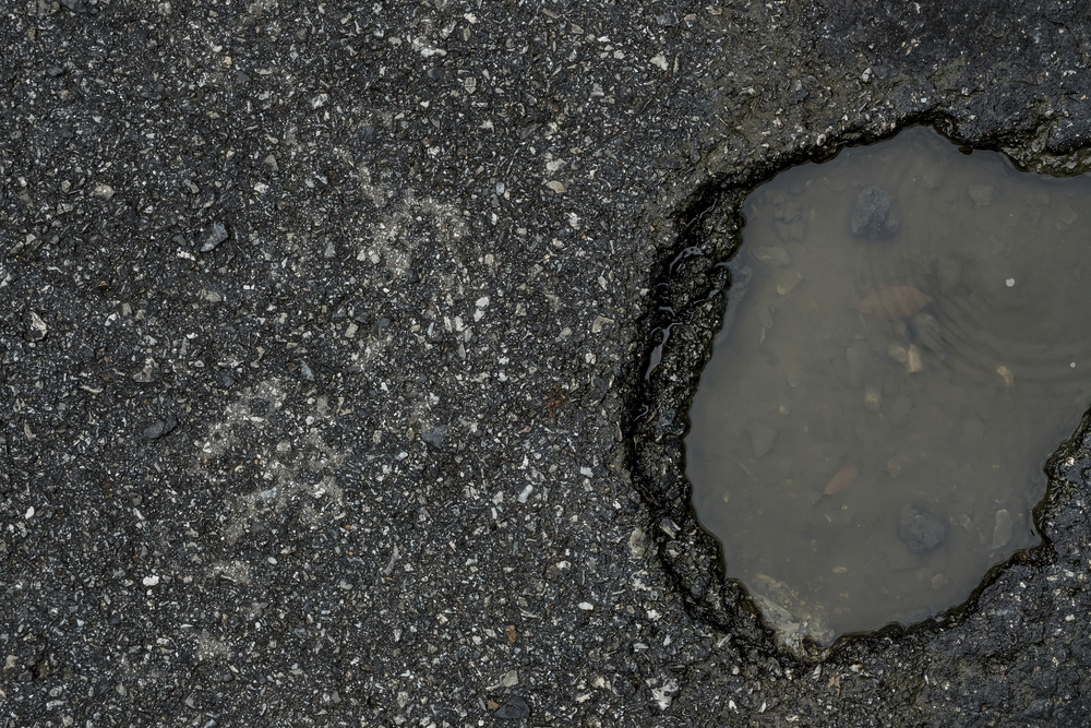 Road,Damaged,A,Water,Basin