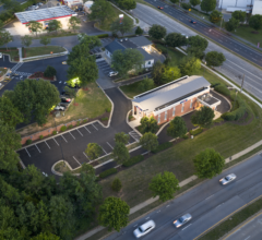 Evening aerial drone view of a completed commercial asphalt paving project