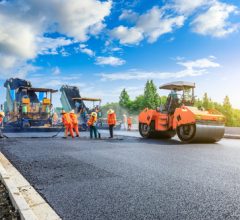 Construction,Site,Is,Laying,New,Asphalt,Road,Pavement,road,Construction,Workers